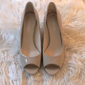Nude peep toe pumps
